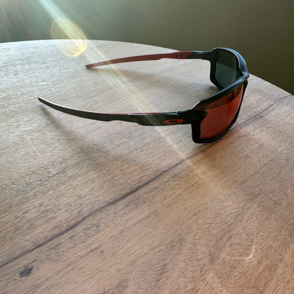 Oakley Black Frame with Red Accents Sunglasses